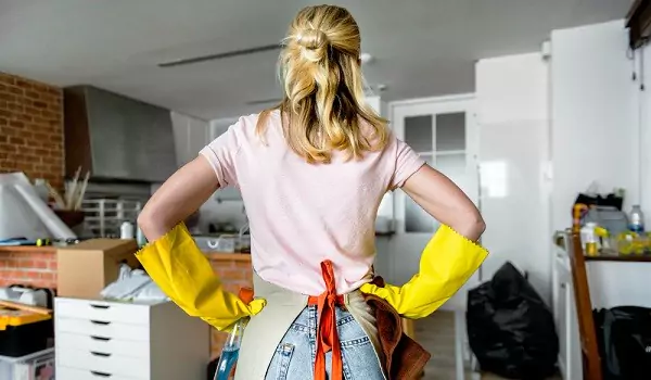 woman ready to organise and clean her home