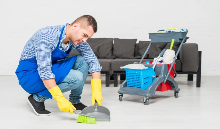 Man cleaning home professionally