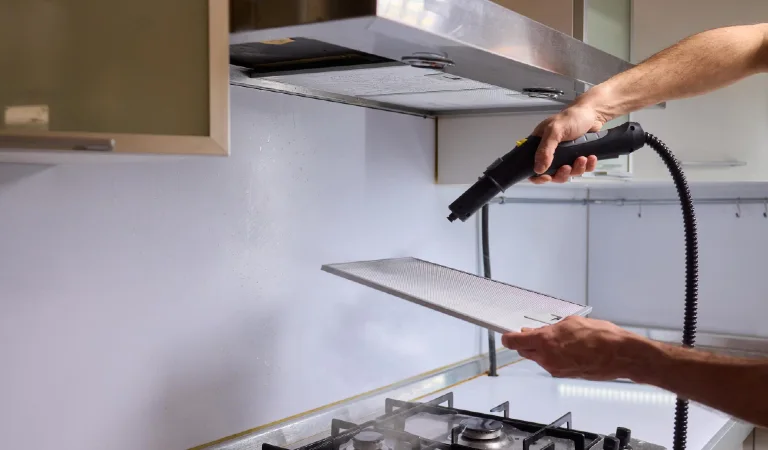 Utilizing steam cleaning techniques on kitchen hood filters for effective deep cleaning tasks