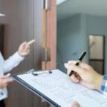 Inspector engineer and owner inspecting quality assurance of house